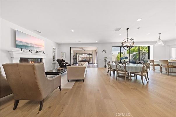Dining room, Fireplace, Interior, Living room, Pendant Lights, Recessed Lighting, Wood Texture Flooring