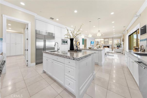 Dining room, Fireplace, Interior, Kitchen, Living room, Pendant Lights, Recessed Lighting, Stainless Steel Appliances