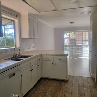 Interior, Kitchen, Tile Countertops, Wood Texture Flooring