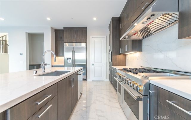 Interior, Kitchen, Marble, Marble Walls, Recessed Lighting, Stainless Steel Appliances