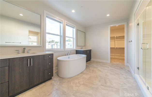 Bathroom, Dual Sink Vanities, Free Standing Baths, Glass Shower, Interior, Recessed Lighting, Walk-in Closets
