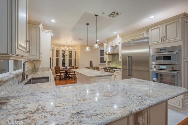 Chandelier, Dining room, Interior, Kitchen, Pendant Lights, Recessed Lighting, Stainless Steel Appliances