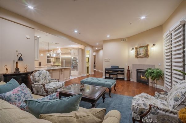 Fireplace, Interior, Kitchen, Living room, Pendant Lights, Piano, Recessed Lighting, Stainless Steel Appliances, Wood Texture Flooring
