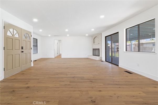 Empty room, Fireplace, Interior, Recessed Lighting, Wood Texture Flooring
