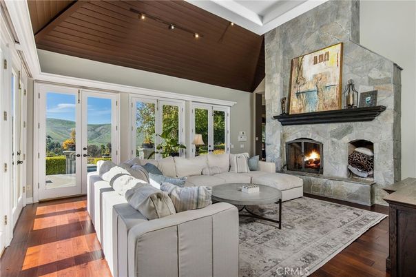 Fireplace, Interior, Living room, Recessed Lighting, Stone Walls, Wooden Ceilings, Wood Texture Flooring