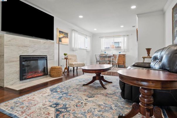 Dining room, Fireplace, Interior, Pendant Lights, Recessed Lighting, Wood Texture Flooring