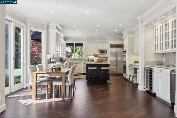 Dining room, Interior, Kitchen, Recessed Lighting, Stainless Steel Appliances, Wood Texture Flooring