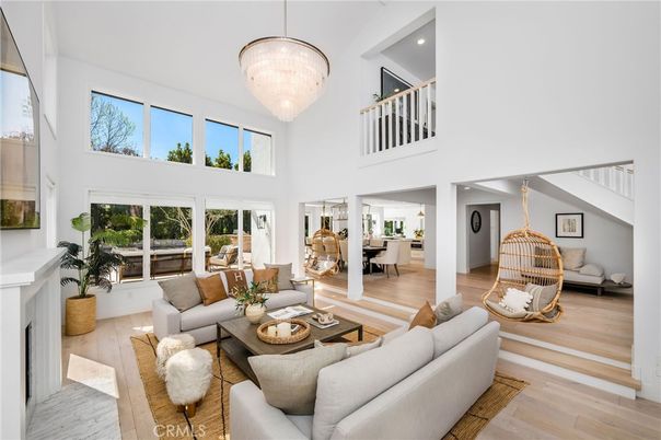 Chandelier, Fireplace, Interior, Living room, Recessed Lighting, Wood Texture Flooring