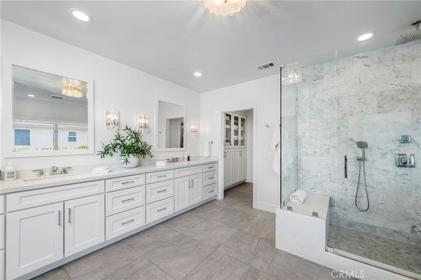 Bathroom, Dual Sink Vanities, Glass Shower, Interior, Marble Walls, Recessed Lighting