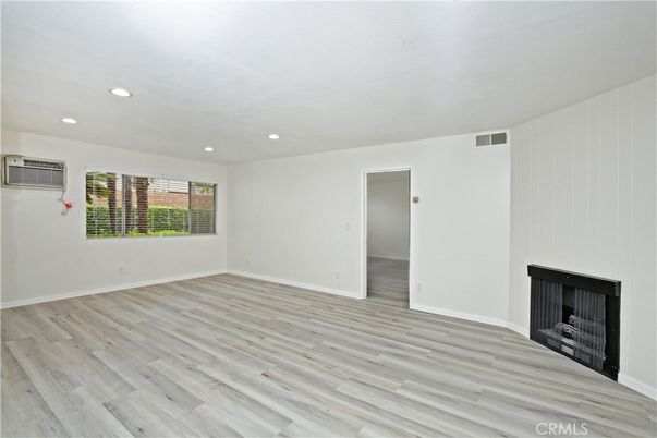 Empty room, Fireplace, Interior, Recessed Lighting, Wood Texture Flooring