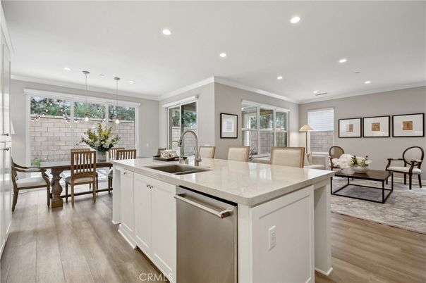 Dining room, Interior, Kitchen, Living room, Pendant Lights, Recessed Lighting, Stainless Steel Appliances, Wood Texture Flooring