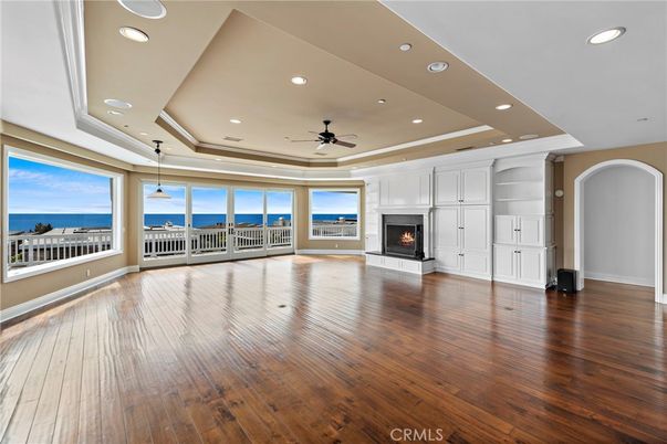 Empty room, Fireplace, Interior, Recessed Lighting, Water, Wood Texture Flooring