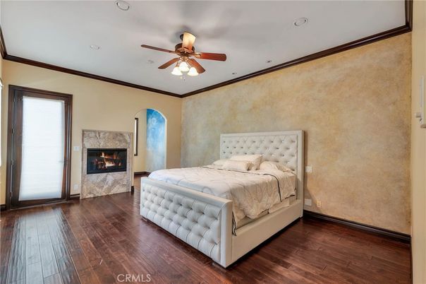 Bedroom, Fireplace, Interior, Recessed Lighting, Wood Texture Flooring