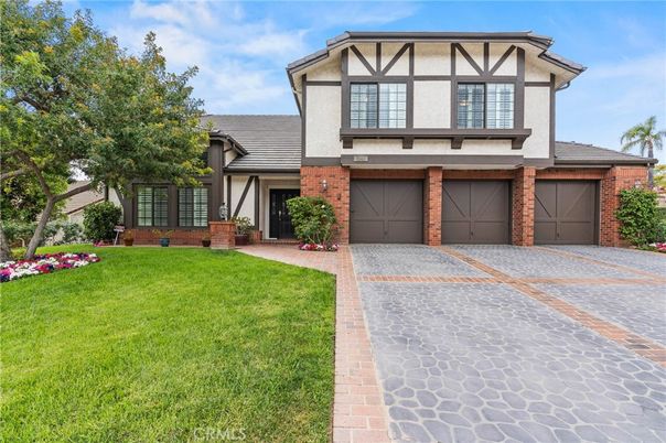 Attached, Exterior, Facade, Brick Facade, Tudor Revival