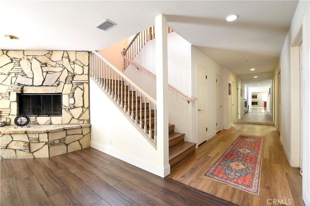 Fireplace, Interior, Recessed Lighting, Stone Walls, Wood Texture Flooring