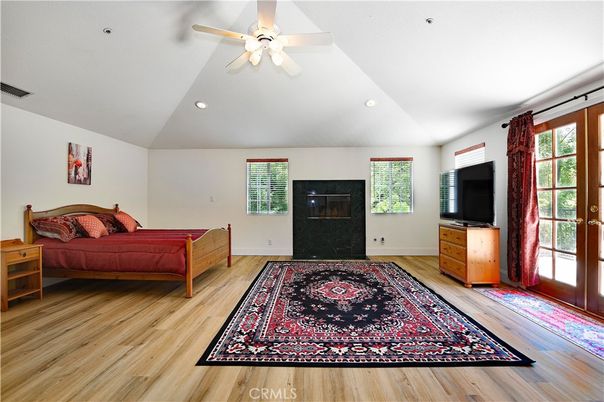 Bedroom, Fireplace, Interior, Recessed Lighting, Wood Texture Flooring