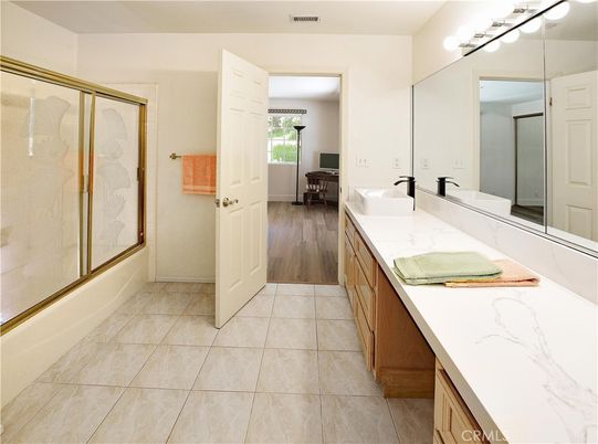 Bathroom, Dual Sink Vanities, Glass Shower, Interior, Wood Texture Flooring