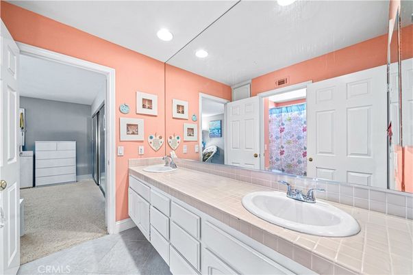 Bathroom, Dual Sink Vanities, Interior, Recessed Lighting, Tile Countertops