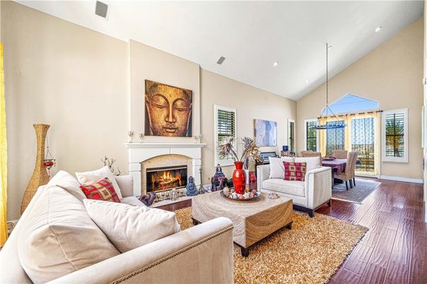 Dining room, Fireplace, Interior, Living room, Pendant Lights, Recessed Lighting, Wood Texture Flooring