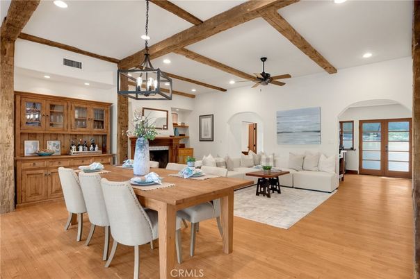 Dining room, Fireplace, Interior, Living room, Pendant Lights, Recessed Lighting, Wooden Beams, Wood Texture Flooring