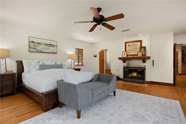 Bedroom, Fireplace, Interior, Recessed Lighting, Wood Texture Flooring