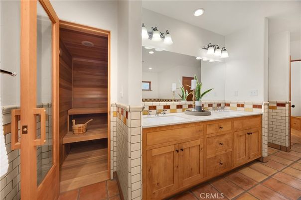 Bathroom, Dual Sink Vanities, Interior, Recessed Lighting, Sauna Room, Tile Countertops