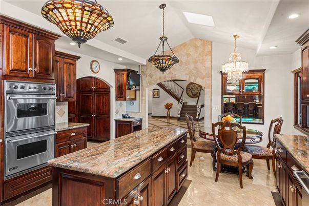 Chandelier, Dining room, Interior, Kitchen, Pendant Lights, Recessed Lighting, Stainless Steel Appliances