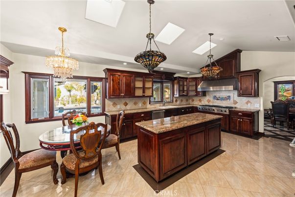 Chandelier, Dining room, Interior, Kitchen, Pendant Lights, Recessed Lighting, Stainless Steel Appliances