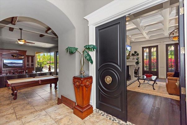 Billiard Table, Fireplace, Game Room, Interior, Living room, Recessed Lighting, Wood Texture Flooring