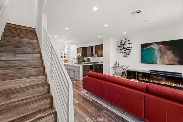 Fireplace, Interior, Kitchen, Living room, Recessed Lighting, Wood Texture Flooring