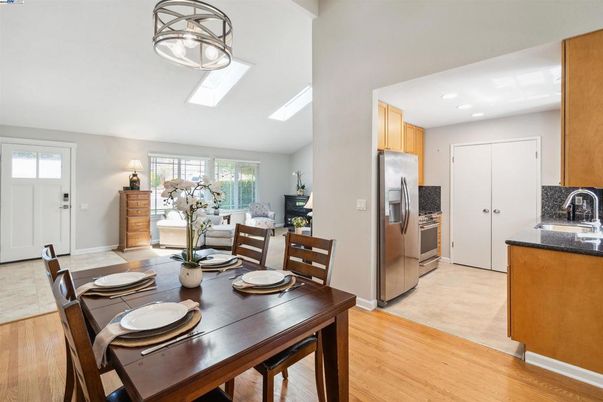 Dining room, Interior, Kitchen, Recessed Lighting, Stainless Steel Appliances, Wood Texture Flooring