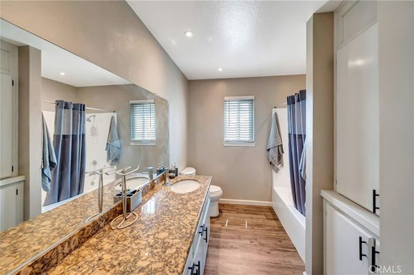 Bathroom, Dual Sink Vanities, Interior, Recessed Lighting, Wood Texture Flooring