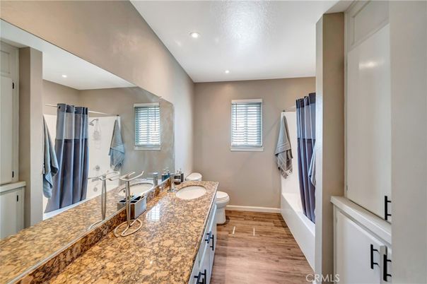 Bathroom, Dual Sink Vanities, Interior, Recessed Lighting, Wood Texture Flooring