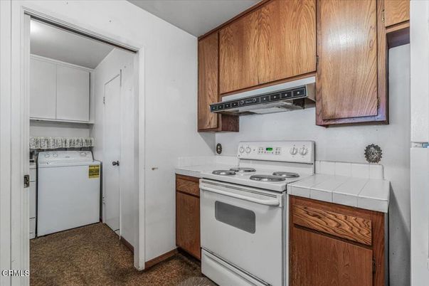Interior, Kitchen, Tile Countertops, Washer