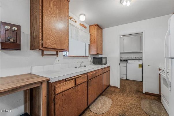 Interior, Kitchen, Tile Countertops, Washer