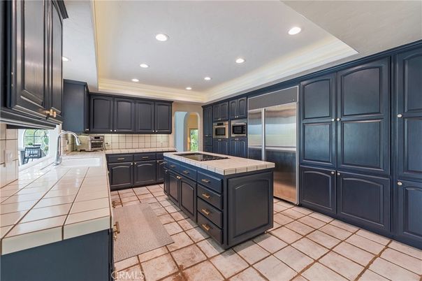 Interior, Kitchen, Recessed Lighting, Stainless Steel Appliances, Tile Countertops