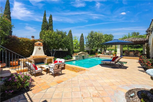 Exterior, Fireplace, Pool