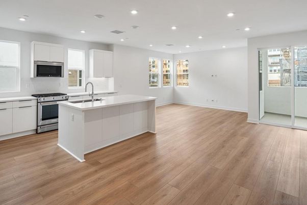 Interior, Kitchen, Recessed Lighting, Stainless Steel Appliances, Wood Texture Flooring