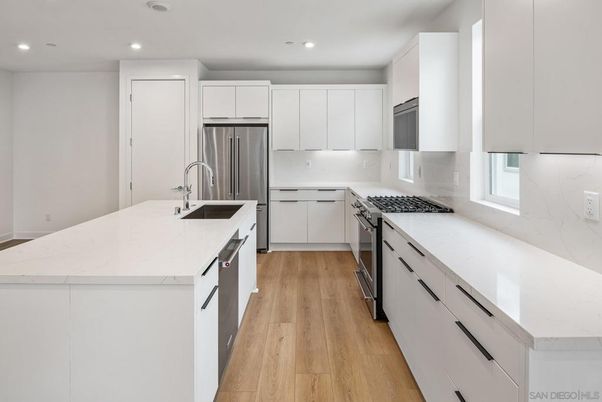 Interior, Kitchen, Recessed Lighting, Stainless Steel Appliances, Wood Texture Flooring