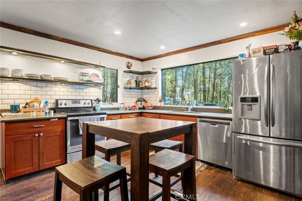 Dining room, Interior, Kitchen, Recessed Lighting, Stainless Steel Appliances, Wood Texture Flooring