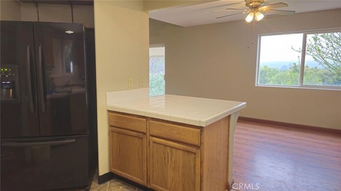 Interior, Kitchen, Tile Countertops, Wood Texture Flooring