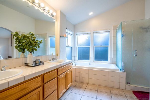 Bathroom, Dual Sink Vanities, Glass Shower, Interior, Recessed Lighting, Tile Countertops