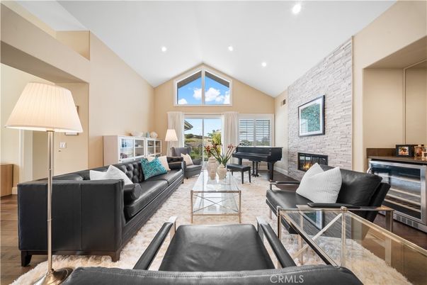 Fireplace, Interior, Living room, Piano, Recessed Lighting, Stone Walls, Wood Texture Flooring