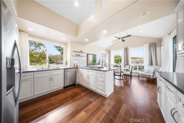Dining room, Interior, Kitchen, Recessed Lighting, Stainless Steel Appliances, Wood Texture Flooring