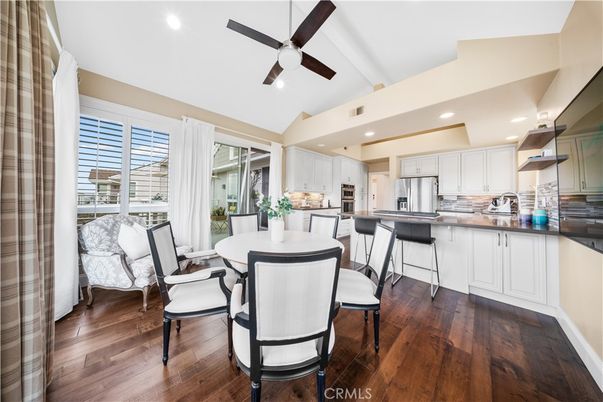 Dining room, Interior, Kitchen, Recessed Lighting, Stainless Steel Appliances, Wood Texture Flooring