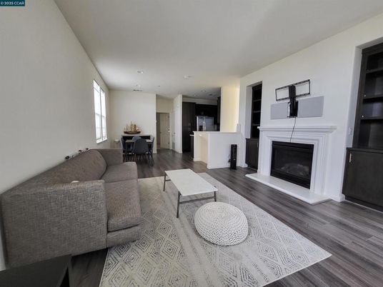 Dining room, Fireplace, Interior, Kitchen, Living room, Recessed Lighting, Wood Texture Flooring