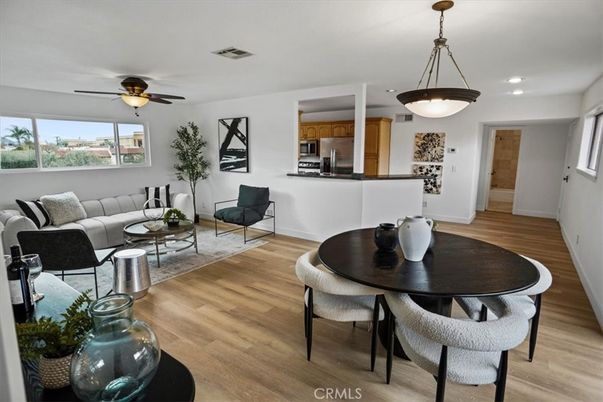 Dining room, Interior, Kitchen, Living room, Pendant Lights, Recessed Lighting, Stainless Steel Appliances, Wood Texture Flooring