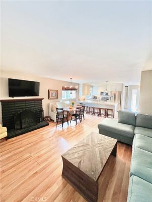 Dining room, Fireplace, Interior, Living room, Pendant Lights, Wood Texture Flooring