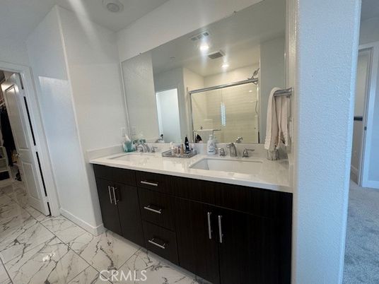 Bathroom, Dual Sink Vanities, Glass Shower, Interior, Marble, Recessed Lighting