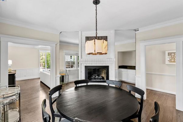 Dining room, Fireplace, Interior, Pendant Lights, Wood Texture Flooring